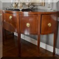 F21. Baker Furniture Historic Charleston mahogany demilune buffet. 37”hx 64”w x27”d 